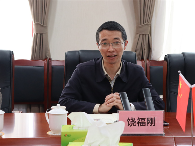 鄧華會見宜賓市供銷社黨委書記、理事會主任饒福剛一行